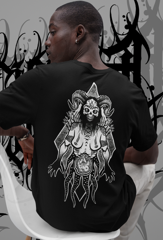 male model sitting on a chair showing back view of hex culture tshirt by venom culture. featuring gothic witchy design by Rachel bones tattoo