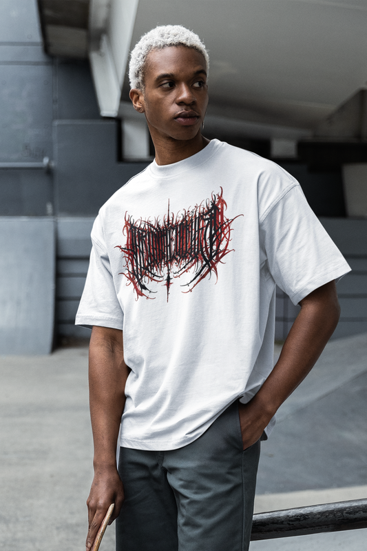 man with beached hair holds skateboard and wears white tshirt featuring front print design blood shadow variation of streetwear label venom culture gothic calligraphy design