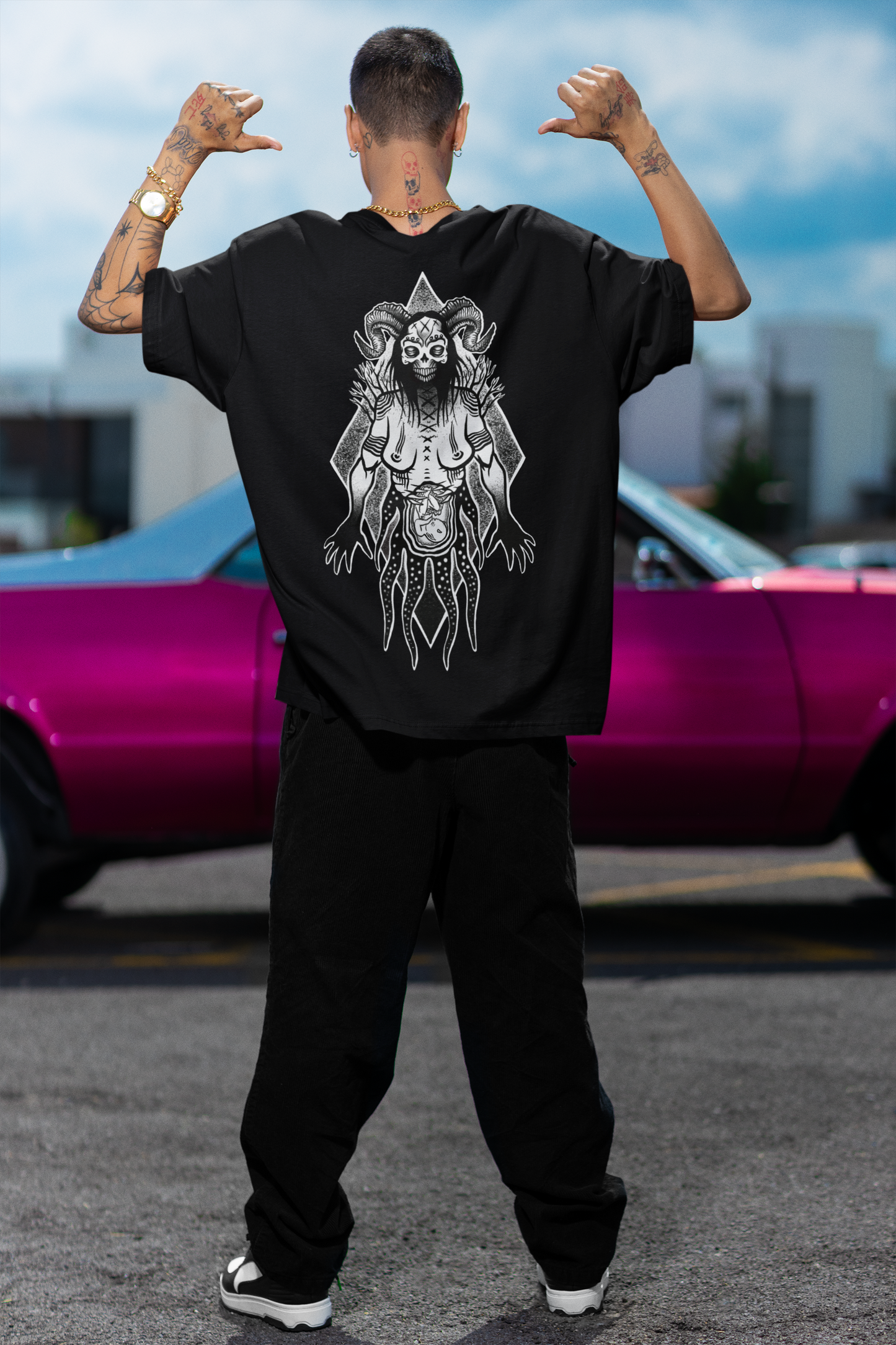 man showing back view of hex culture tshirt featuring gothic witchy print designed by rachel bones tattoo