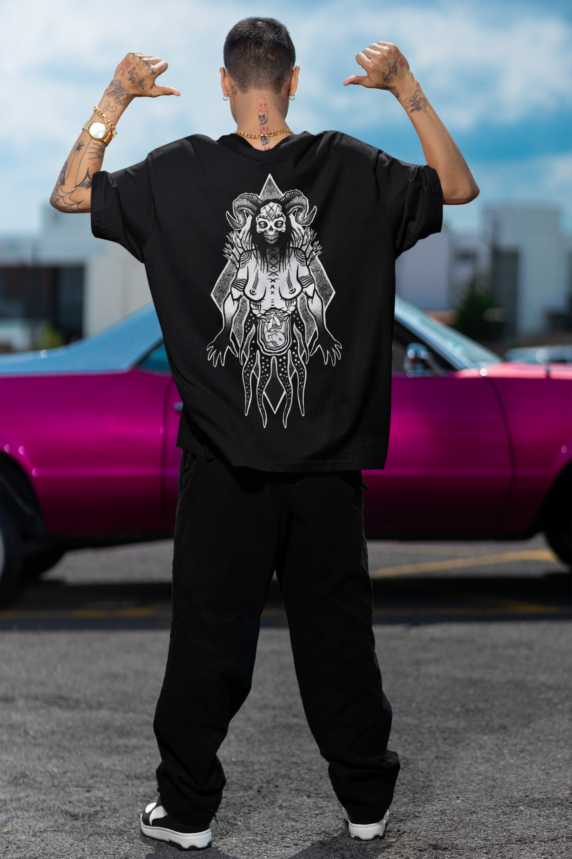man showing back view of hex culture tshirt featuring gothic witchy print designed by rachel bones tattoo